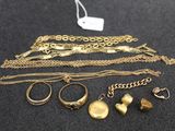 a collection of gold jewellery including rings, bracelets and rings