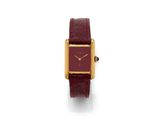 an image of a red and gold wrist watch with a square face