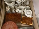 a box full of different items that are sitting on the floor