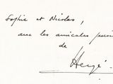an old black and white photo of a person ' s handwriting on a piece of paper