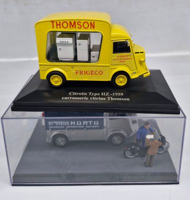 a yellow truck that is sitting in a clear case