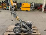 a machine that is sitting on a pallet in a warehouse