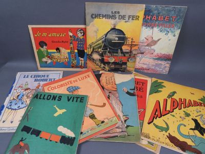 several children ' s books sitting on a table with a blue background