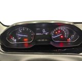a close up of a car dashboard with a speedometer and gauges
