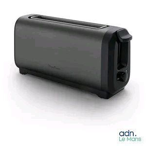 an image of a toaster that is sitting on a white surface