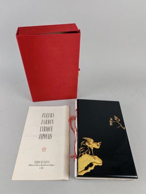 two books sitting next to each other on top of a table