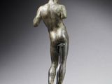 an image of a bronze statue of a woman on a pedestal