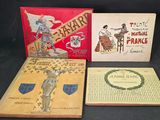 trois livres pour enfants posés sur une table, sur fond noir
