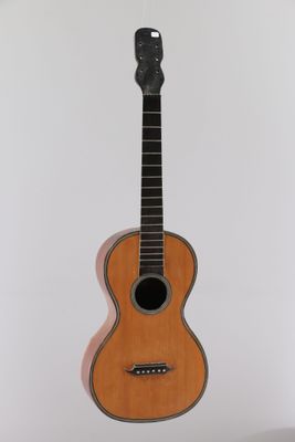 an image of a guitar hanging on a wall in a room