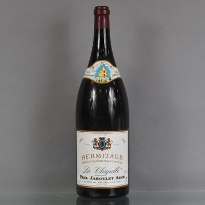 a bottle of wine that is sitting on a table