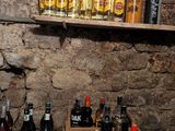 many bottles of alcohol on the shelves in the room