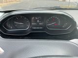 a close up of a car dashboard with a speedometer and gauges