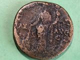 an old coin with a picture of a man on it