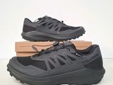 a pair of men ' s salida trail running shoes in a box