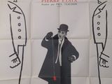 movie poster of a man in a top hat and a coat