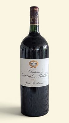 a bottle of wine that is sitting on a table