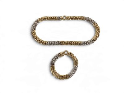 two gold and silver bracelets and a ring on a white background