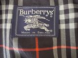 a close up of a burberry ' s label on a shirt