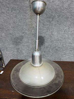 a lamp that is sitting on top of a wooden table