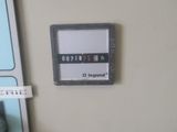 a picture of a sign on the wall of a bathroom