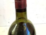 a bottle of wine that is sitting on a table