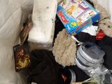 a bag full of stuff that is sitting on the floor
