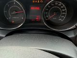 a close up of the dashboard of a car with the gauges on