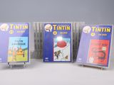 trois DVD de Tintin et Tintin dans un présentoir