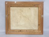 an old picture frame with a picture of a person in it