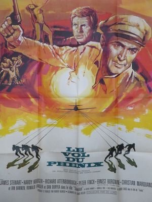 une vieille affiche de cinéma représentant deux hommes armés devant un coucher de soleil