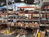 a large amount of boxes on the shelves in the warehouse