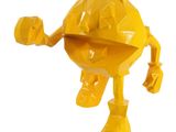 un jouet jaune qui se tient debout, les bras écartés