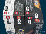 boxes of lego star wars toys are stacked on top of each other