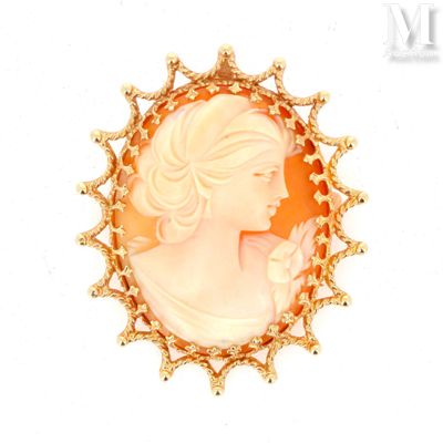 an image of a picture of a woman in a gold broocher