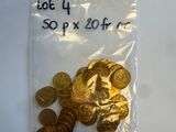 a bag of gold coins on a table with a price tag