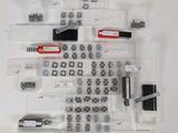 a close up of a bunch of tools on a white surface