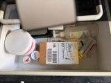 a small box with a lot of medicine in it