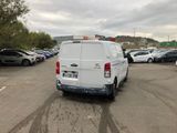 a white van that is parked in a parking lot