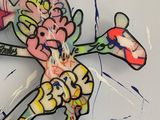 painting of a mickey mouse holding a tennis racket on a white surface