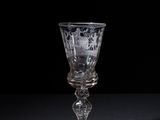 a glass that is sitting on a table