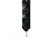a close up of a speaker with a remote on a stand