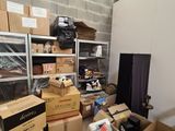a room filled with boxes and other items in it