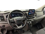 a dashboard of a car with a phone in it