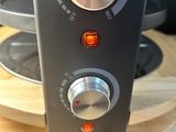 an image of a close up of a toaster on a table