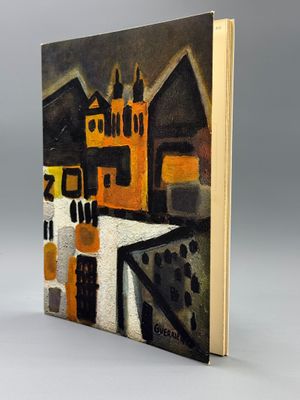 an image of a book with a picture of a city on it