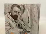 an old photo of a man with a beard and a mustache
