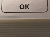a sign that says allumage ok on the side of a box