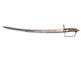 a close up of a knife with a metal handle on a white background