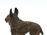 figurine of a french bulldog on a white background