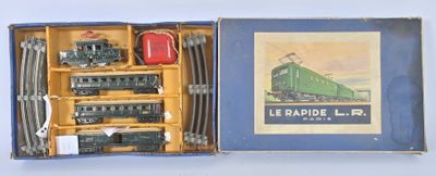 a box with a train set in it on a table